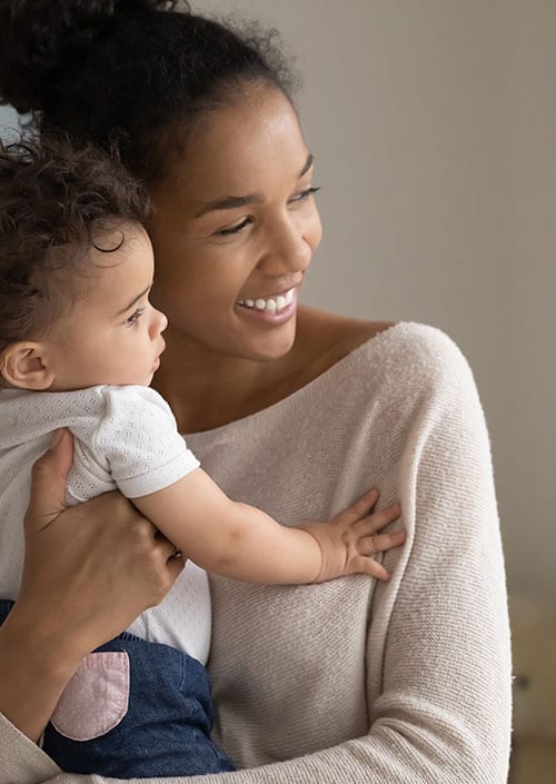 Mother and child looking out the window