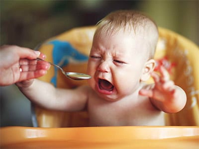 Baby crying while eating